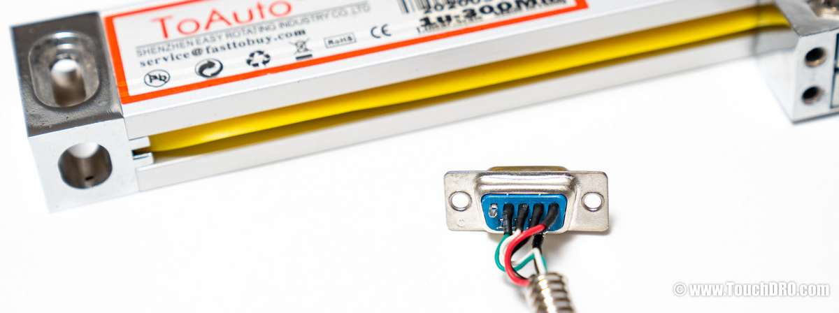 ToAuto-style Chinese DRO scale DB-9 connector opened up, showing four wires soldered to pins 1 through 4 in the top row only