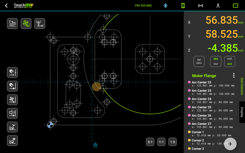 An imported CAD drawing at true scale, with hole and arc centers extracted as tagged sub-datums.