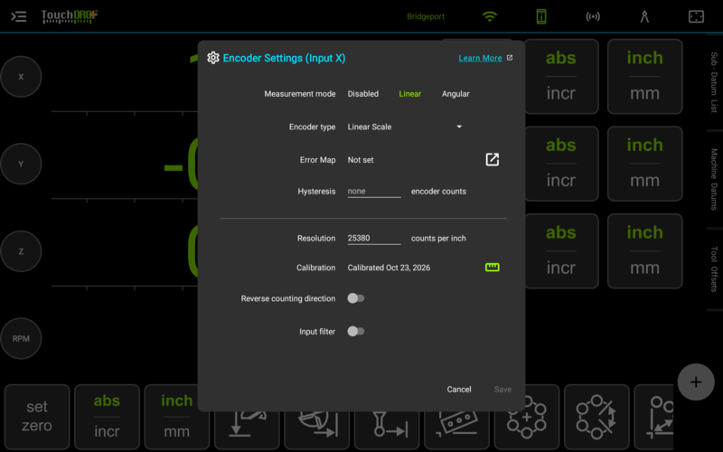 Fig. 8: The "Encoder Settings" dialog after "Apply", with the measured resolution stored The Encoder Settings dialog for input X after calibration, with the resolution at 25380 counts per inch, the Calibration row reading Calibrated Oct 23, 2026, and the ruler button green