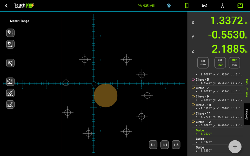 TouchDRO graphical view with two vertical guides; the active guide and its row in the sub-datum list are highlighted