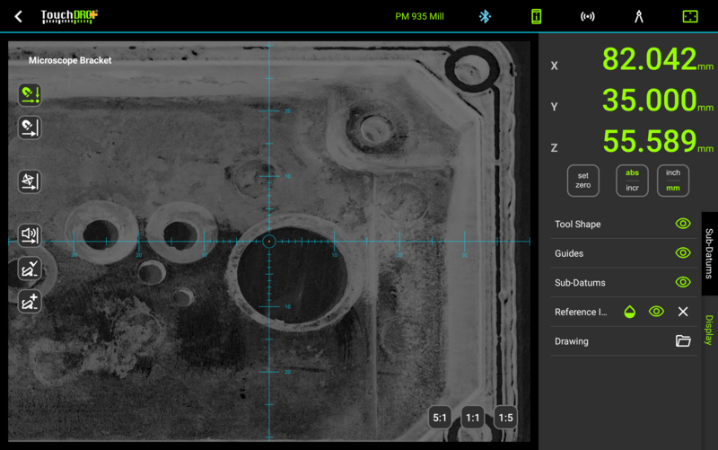 Fig. 8: The aligned photo in the graphical view at half opacity, with the crosshairs sitting on one of the holes