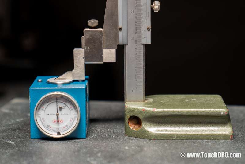 Fig. 2: Measuring the setter's actual base-to-anvil height with a height gauge Measuring a dial tool height setter's base-to-anvil height with a vernier height gauge