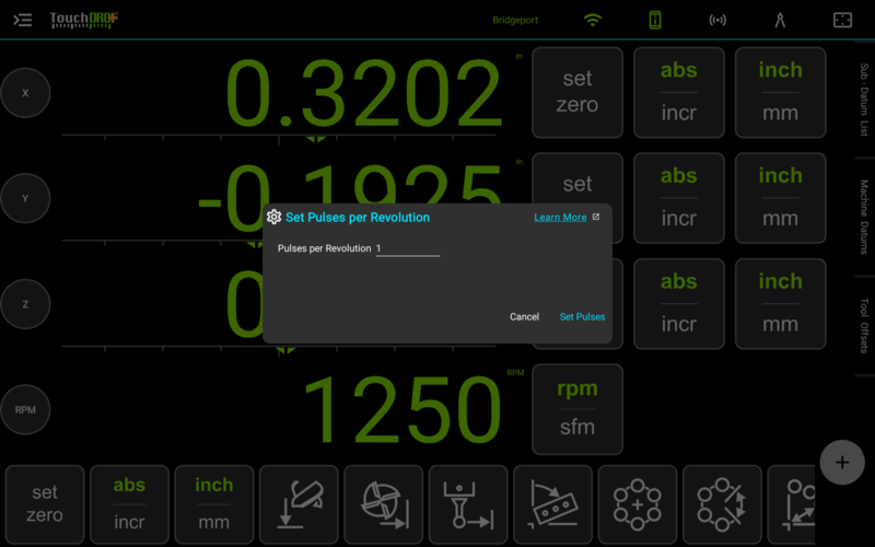 Fig. 2: The "Set Pulses per Revolution" dialog, opened from the gear on the tachometer input The Set Pulses per Revolution dialog over the main readout screen, with the Pulses per Revolution field and the Cancel and Set Pulses buttons