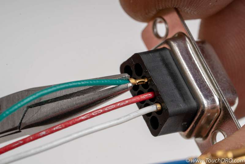 Use needle nose pliers to press-in the pin DIY DRO Adapter for Glass Scales inserting pin into D-Sub connector