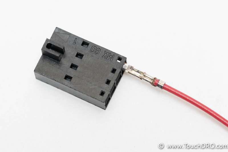 Insert the tinned pin into the Molex connector body