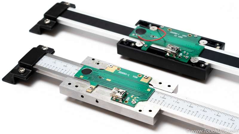 Aluminum (top) and Stainless Steel (bottom) Scales Aluminum and stainless steel scale side by side