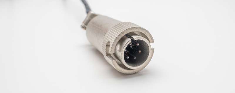 Close-up of the 6-pin Hirose RM12 male connector used on Mitutoyo AT2-N / AT11-N scale cables